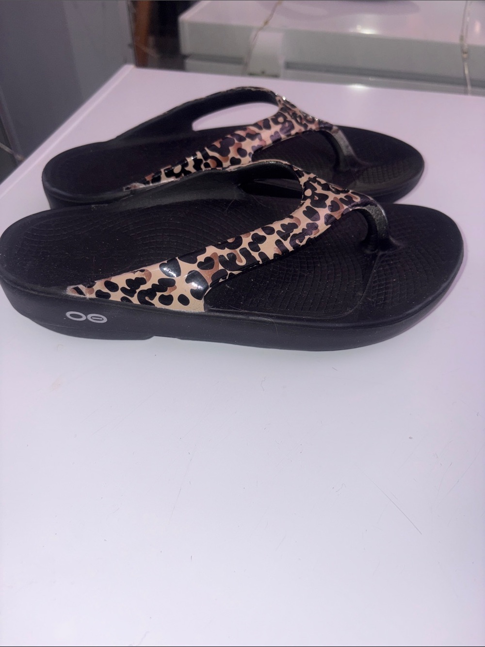 OOFOS Leopard Print Black Flip Flop Sandals